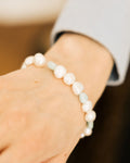 Baroque Freshwater Pearl Bracelet close-up worn on wrist in blue blazer